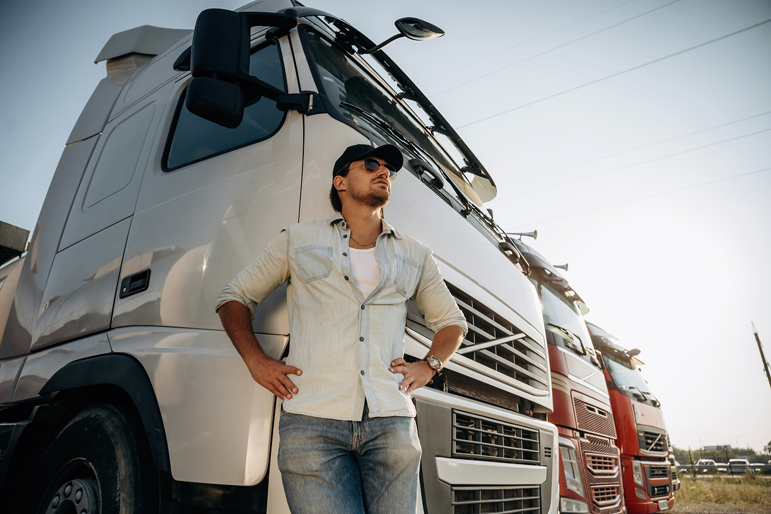 truck-driver-leaning-on-his-lorry-in-sunlight-2026-03-24-05-02-56-utc